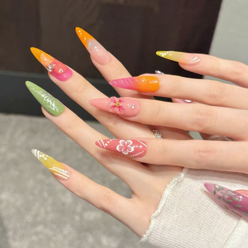 Eye-catching long stiletto nails with tropical gradients, botanical art & sculptural blooms - fierce island-inspired collection