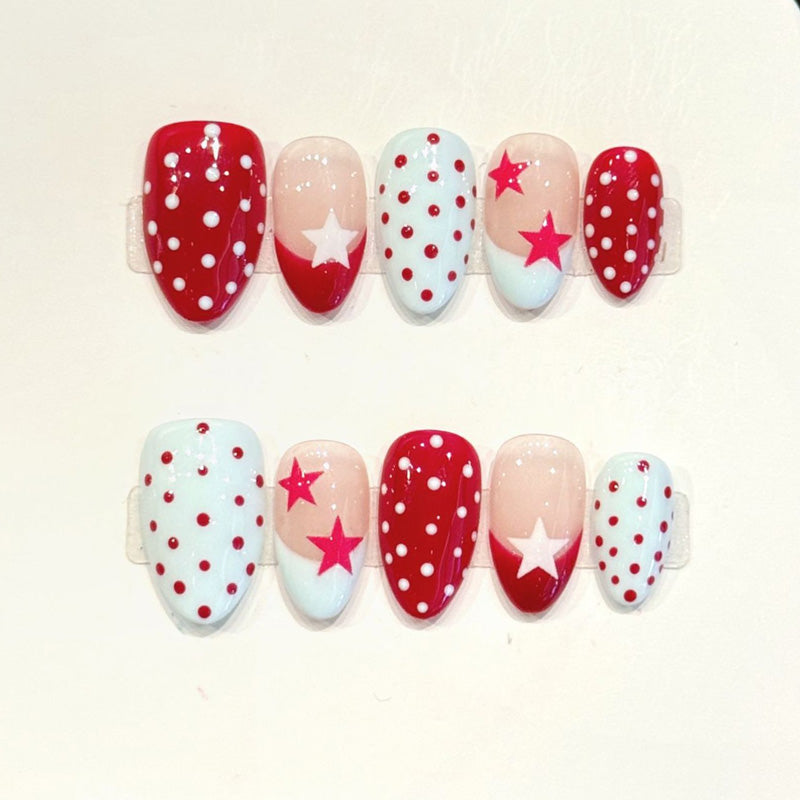 Festive Americana almond press-ons with 3D red stars, playful polka dots & rhinestones - handcrafted red, white & blue nail art