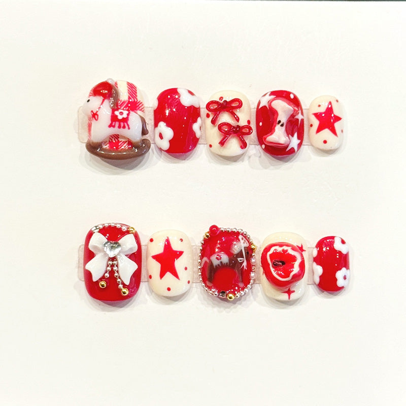 Festive handmade squoval nails with red & white, 3D bow charms & gemstone centerpiece - Classic Christmas elegance - Applies in 15 minutes