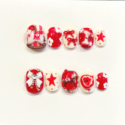 Festive handmade squoval nails with red & white, 3D bow charms & gemstone centerpiece - Classic Christmas elegance - Applies in 15 minutes