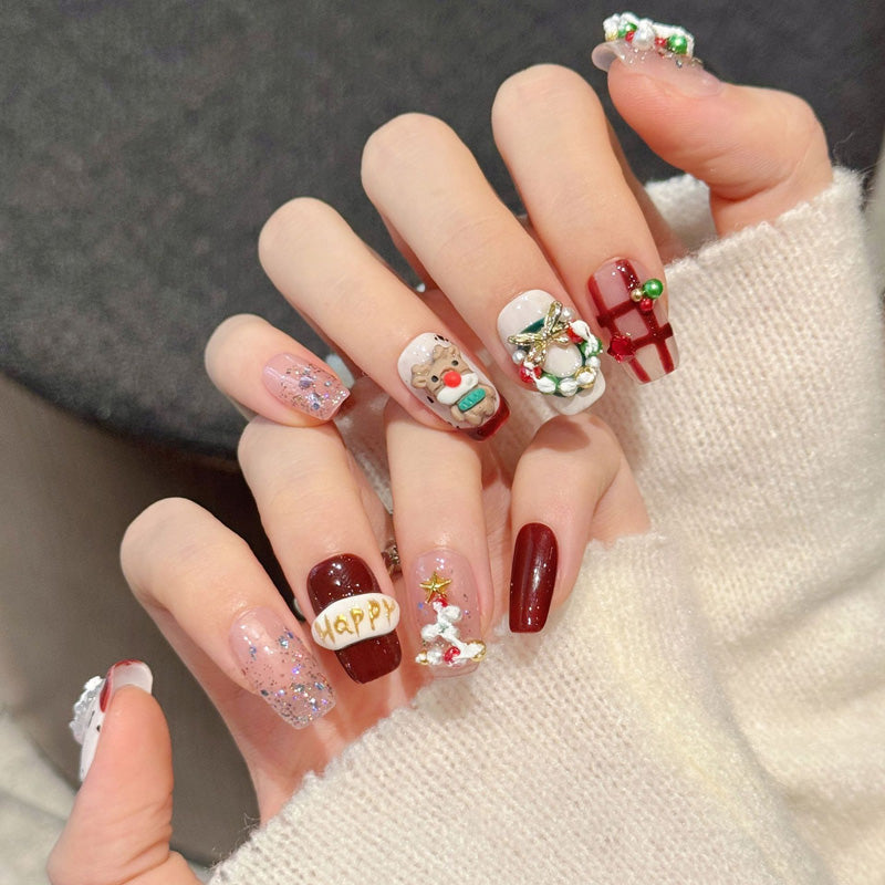 Festive squoval short press-on nails with 3D Santa, gingerbread, wreath & candy cane - perfect for happy Christmas parties & holiday celebrations