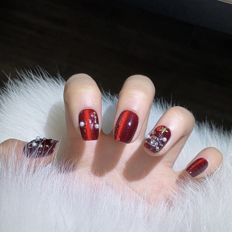 Glamorous coffin short press-on nails with ruby red chrome, pearls & crystals - perfect for ruby Christmas glamour & festive celebrations