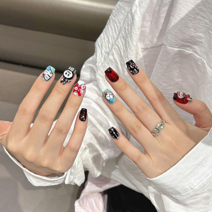 Handcrafted Halloween nails featuring adorable anime-style characters mixed with spooky elements - coffin short shape collection