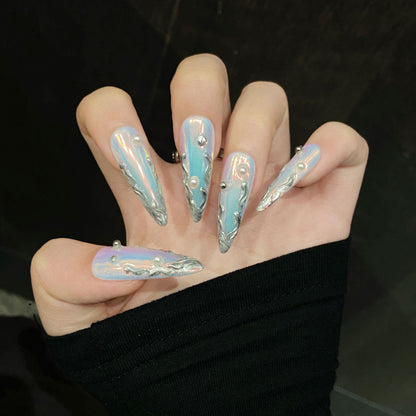 Handcrafted mirror-finish press-on nails with wave patterns and crystals. Two shapes in one set for ultimate versatility.