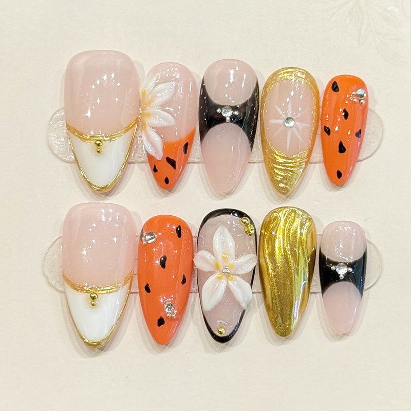 KAPOWNAILS almond nails featuring bold design - delicate white flower, metallic gold, vibrant leopard, black accents, handcrafted quality, 10-piece set