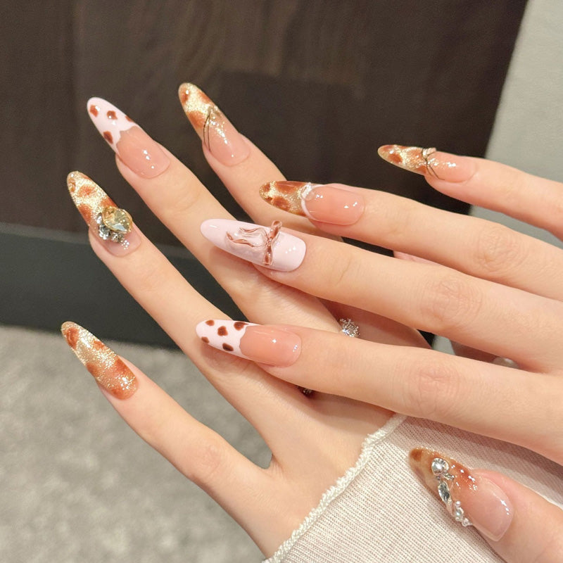 KAPOWNAILS almond nails featuring romantic design - adorable pink bows, sparkling heart crystals, gold glitter, burgundy hearts, handcrafted quality, 10-piece set