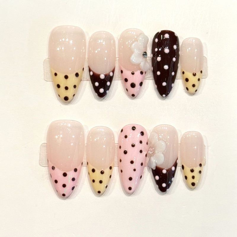 KAPOWNAILS almond nails featuring sweet design - playful polka dots, delicate bow, pink-brown ombre, translucent jelly, handcrafted quality, 10-piece set
