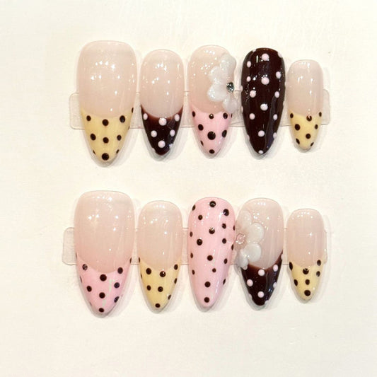 KAPOWNAILS almond nails featuring sweet design - playful polka dots, delicate bow, pink-brown ombre, translucent jelly, handcrafted quality, 10-piece set