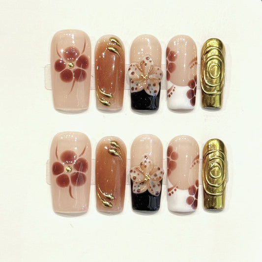 KAPOWNAILS coffin medium nails featuring opulent design - delicate burgundy flower, gold foil leaf, French tips, crystals, handcrafted quality, 10-piece set