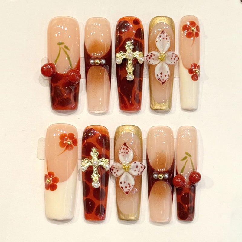 KAPOWNAILS coffin nails featuring elegant design - glossy red cherries, silver crystal cross, pink flowers, tortoiseshell, handcrafted quality, 10-piece set