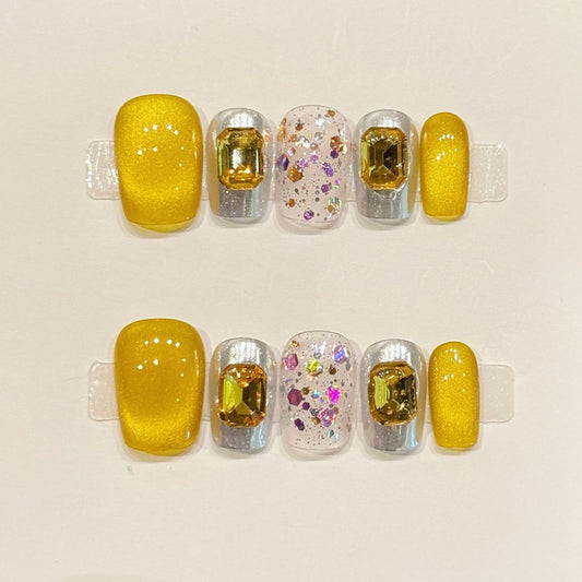 KAPOWNAILS coffin nails featuring opulent design - vibrant yellow citrine, golden gemstone crystals, silver chrome, multicolor glitter, handcrafted quality, 10-piece set