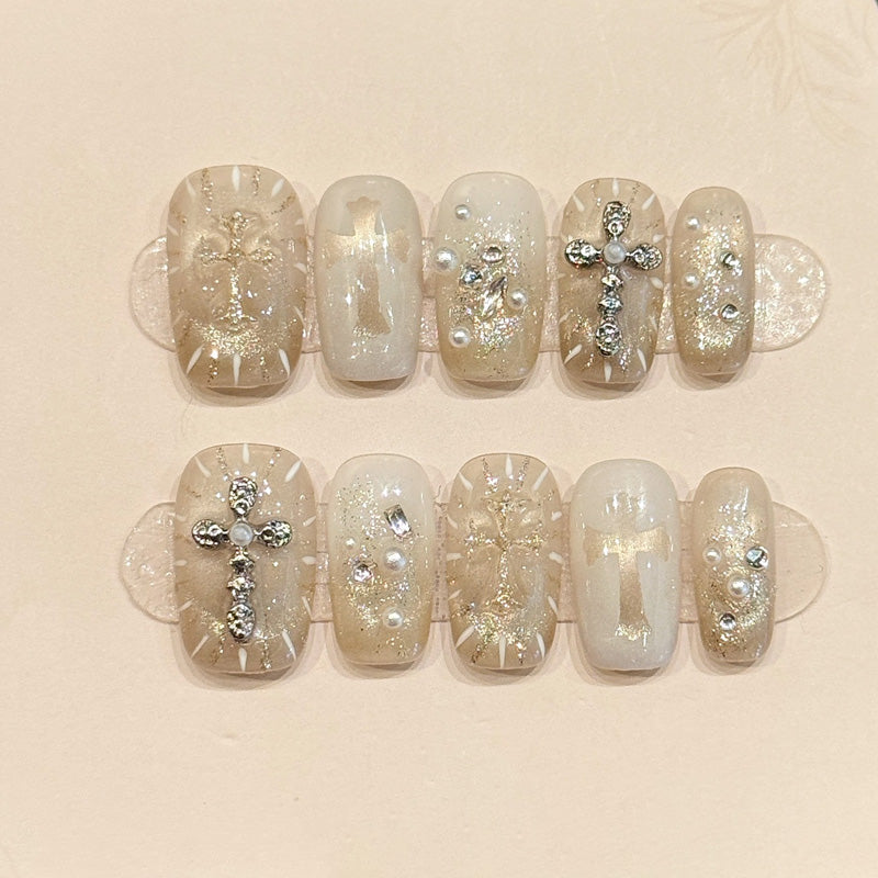 KAPOWNAILS coffin nails featuring spiritual design - sparkling cross, delicate angel wings, silver glitter, translucent jelly, handcrafted quality, 10-piece set