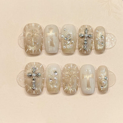 KAPOWNAILS coffin nails featuring spiritual design - sparkling cross, delicate angel wings, silver glitter, translucent jelly, handcrafted quality, 10-piece set
