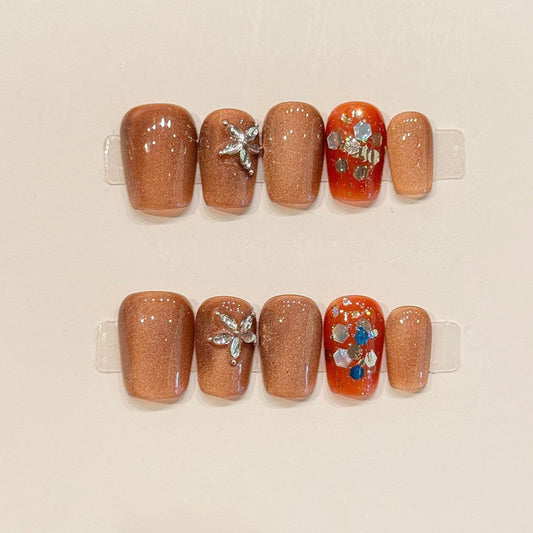 KAPOWNAILS coffin short nails featuring autumn design - delicate silver flower, warm bronze-gold shimmer, orange, crystals, handcrafted quality, 10-piece set