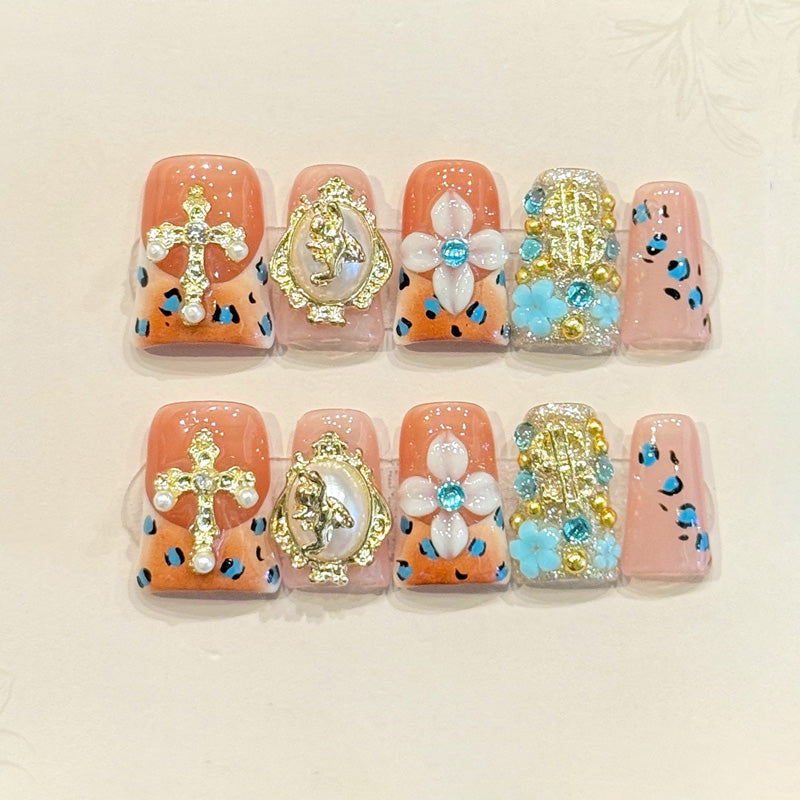 KAPOWNAILS duck nails featuring ornate baroque design - luxurious gold cross, vintage frame, pearl flowers, turquoise accents, handcrafted quality, 10-piece set