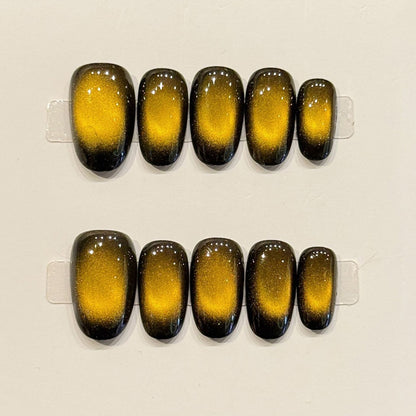 KAPOWNAILS oval nails featuring bold design - vibrant yellow to black ombre, sparkling shimmer, dramatic transitions, handcrafted quality, 10-piece set