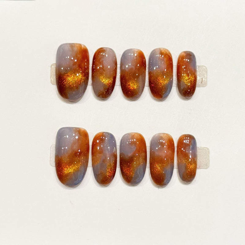 KAPOWNAILS oval nails featuring classic tortoiseshell design - rich amber tones, champagne gold sparkle, glossy finish, handcrafted quality, 10-piece set