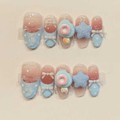 KAPOWNAILS oval nails featuring kawaii design - delicate blue rose, sparkling star, white bow, soft gradient, handcrafted quality, 10-piece set