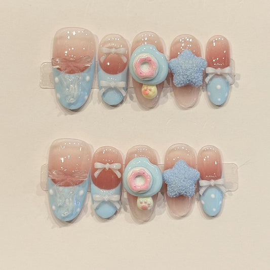 KAPOWNAILS oval nails featuring kawaii design - delicate blue rose, sparkling star, white bow, soft gradient, handcrafted quality, 10-piece set