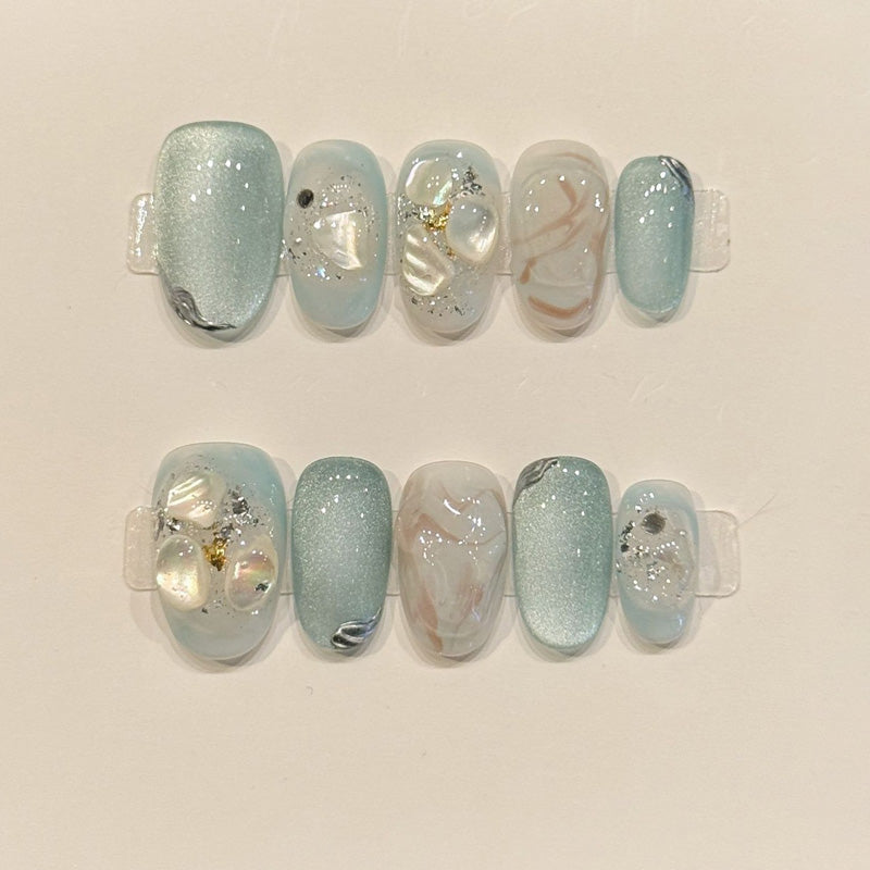 KAPOWNAILS oval nails featuring oceanic design - delicate pearl flowers, baby blue shimmer, holographic sparkle, handcrafted quality, 10-piece elegant set