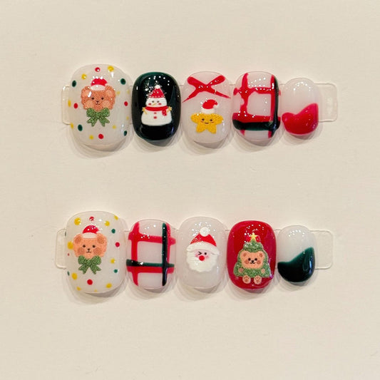 KAPOWNAILS squoval nails featuring Christmas design - adorable Santa, cute bear with scarf, snowman, gift box, bow, handcrafted quality, 10-piece festive set