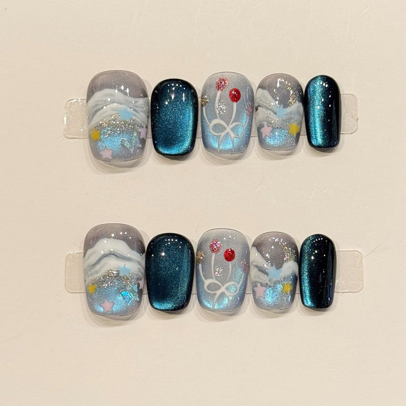 KAPOWNAILS squoval nails featuring dreamy design - sparkling blue shimmer, delicate flowers, white bow, translucent jelly, handcrafted quality, 10-piece set