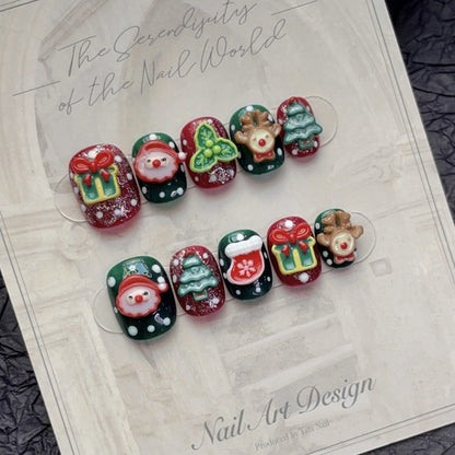 KAPOWNAILS squoval short nails featuring adorable Christmas characters - Santa, reindeer, tree, gingerbread, handcrafted quality, 10-piece festive set