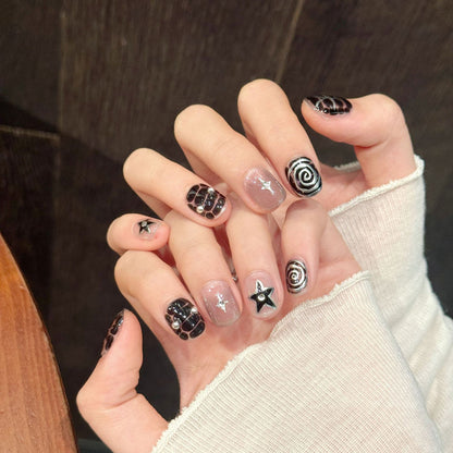 KAPOWNAILS squoval short nails featuring gothic design - intricate spider web, hypnotic spirals, crystal stars, handcrafted quality, 10-piece mystical set