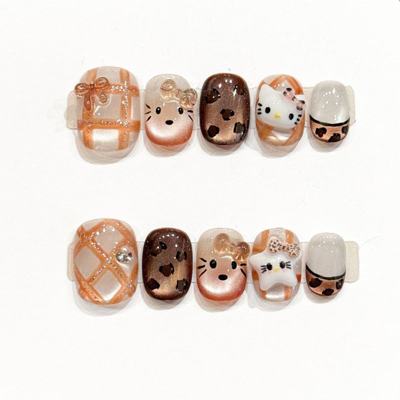 KAPOWNAILS squoval short nails featuring kawaii animal design - cute kitty, sweet bears, leopard spots, gold bows, handcrafted quality, 10-piece charm set