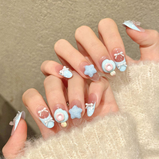 Kawaii oval nails with 3D blue flower, textured star, bow & gradient - perfect for blue pink flower star bow pastel sweet charm & dreamy style