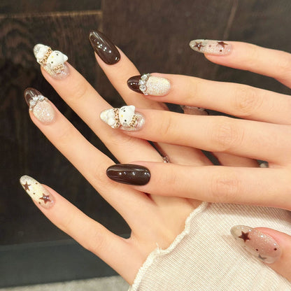 Kawaii oval nails with Hello Kitty, stars, silver glitter & black gloss - perfect for Hello Kitty star glitter black silver kawaii playful charm