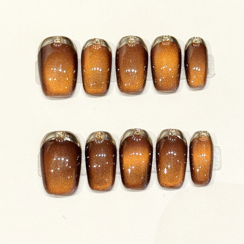 Luxurious coffin press-ons with amber gradient, crystallized sugar texture & gold French tips - handcrafted tactile nail art