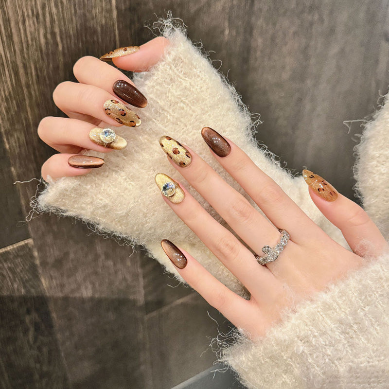 Luxurious oval short press-on nails with chocolate, cream & gold design - crystal embellishments, perfect for fall coffee dates & cozy vibes