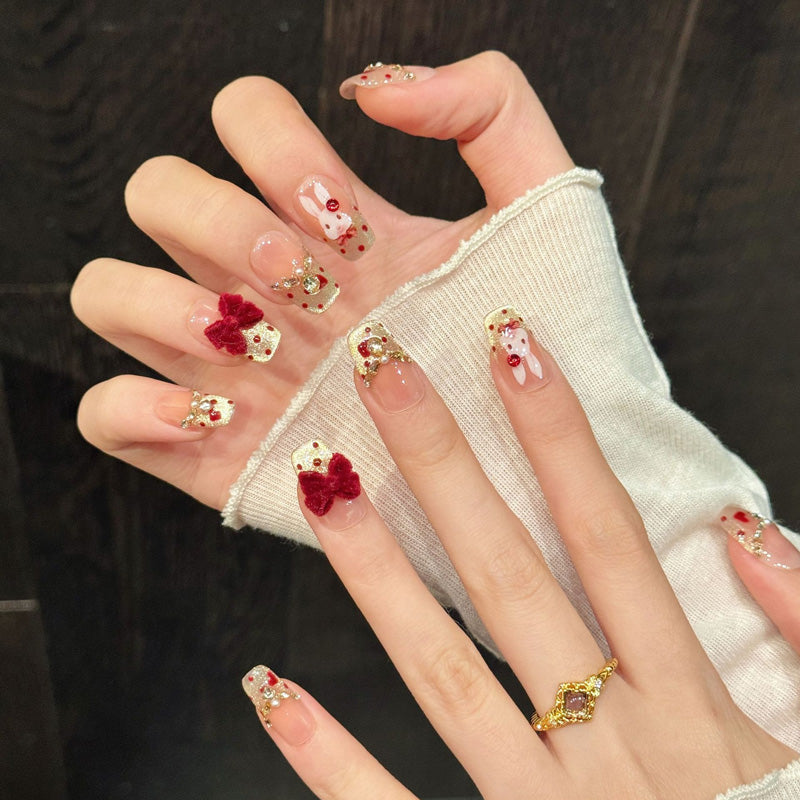 Luxurious press-on nails with 3D velvet bow