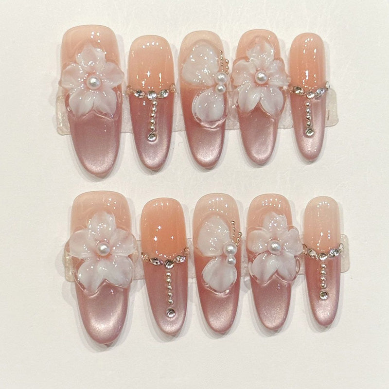 Luxury handmade oval nails with rose gold chrome & floral rhinestones - Reusable, salon-quality - Applies in 15 minutes