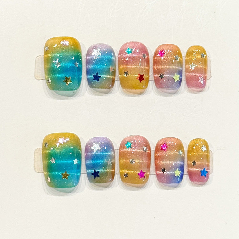Magical handmade squoval nails with rainbow ombre gradient, holographic star confetti & jelly finish - Vibrant joy - Applies in 15 minutes