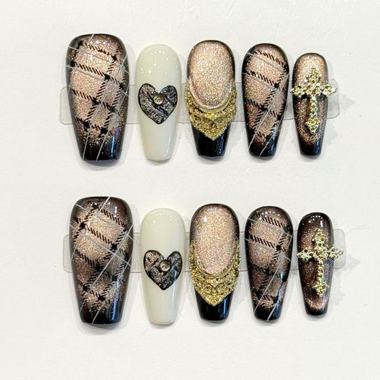 Opulent coffin press-ons with champagne shimmer, textured chevron patterns, rhinestone heart & gold cross - handcrafted luxury