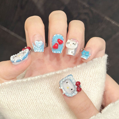 Playful coffin press-on nails featuring character art, 3D hearts & sparkle - Cute salon quality at home - Complete set of 10