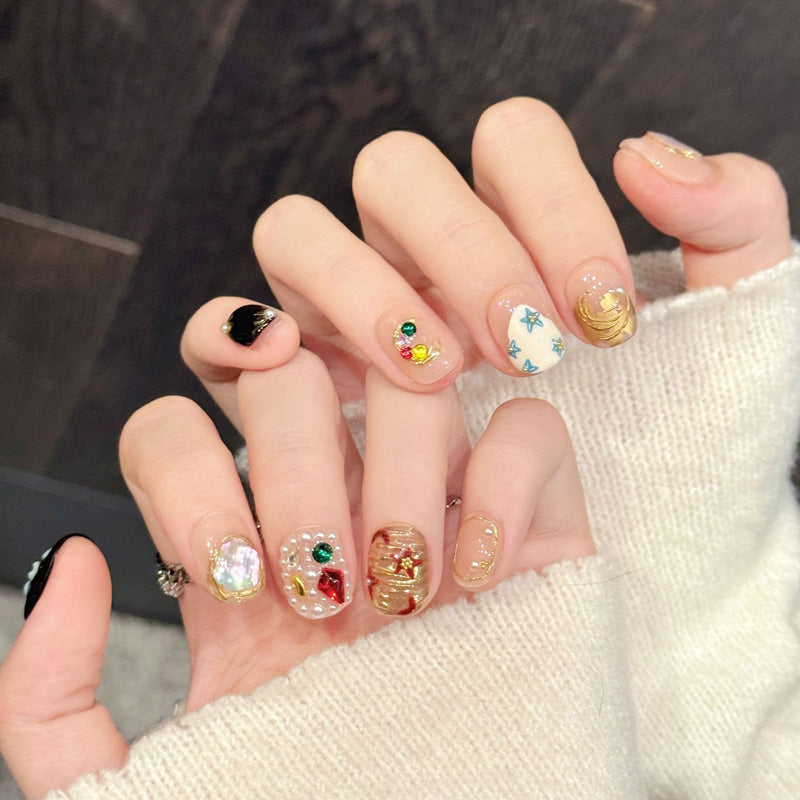 Playful squoval false nails featuring rainbow shell fragments, pearl patterns, celestial stars & lunar crescents - whimsical 10-piece set