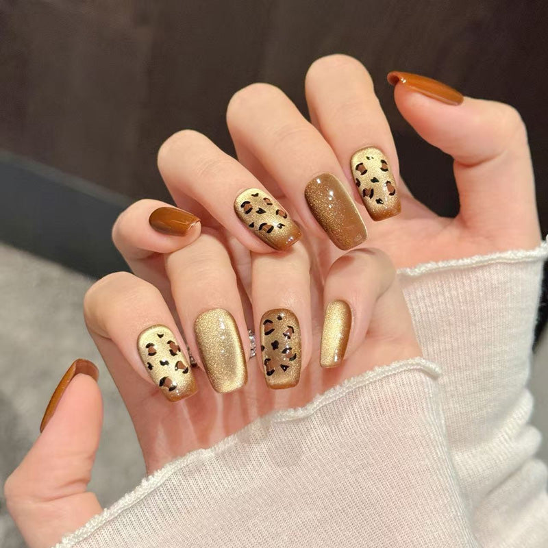 Premium almond long press-on nails for wild elegance - sophisticated leopard print, luxurious gold glitter, perfect for fashion-forward looks