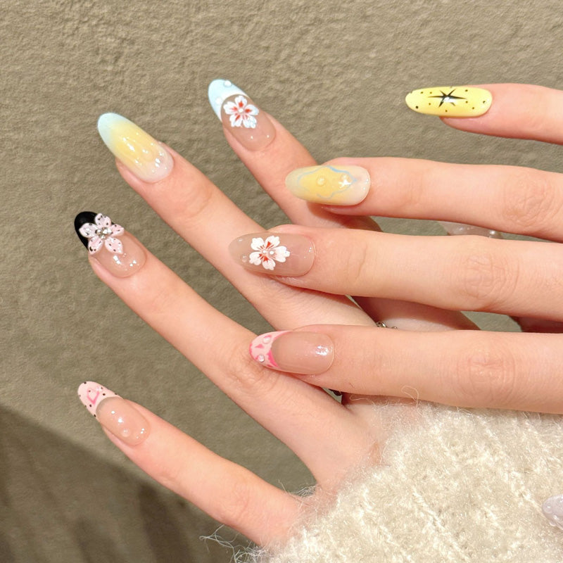 Premium almond nails for spring elegance - 3D floral design, adorable butterfly, blue-yellow-pink ombre, sparkling stars, perfect for spring celebrations
