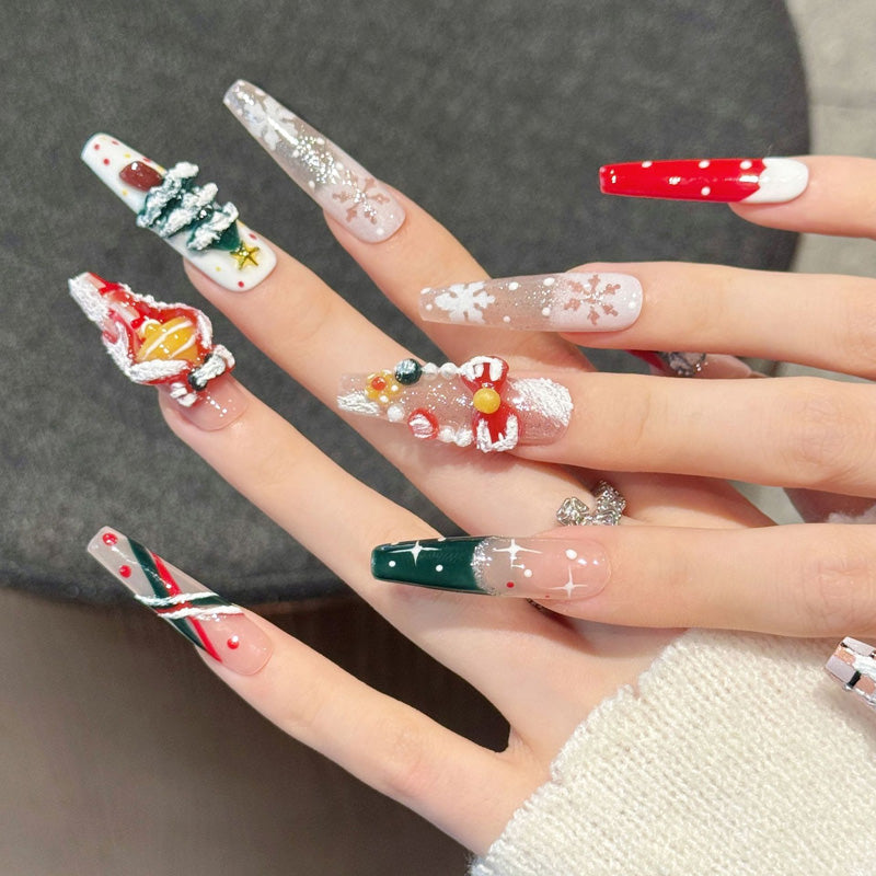 Premium coffin long press-on nails for Christmas magic - adorable 3D Santa, sparkling tree, candy cane stripes, perfect for festive celebrations