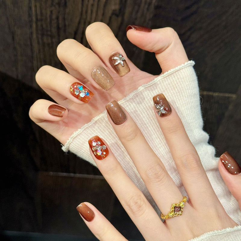 Premium coffin short nails for autumn charm - metallic silver flower, seasonal shimmer, vibrant orange, sparkling rhinestones, perfect for autumn celebrations