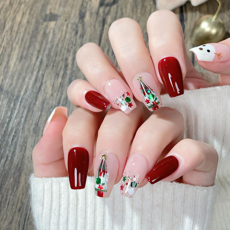 Premium coffin short press-on nails for Christmas joy - whimsical reindeer, gold star tree, colorful confetti, perfect for festive parties