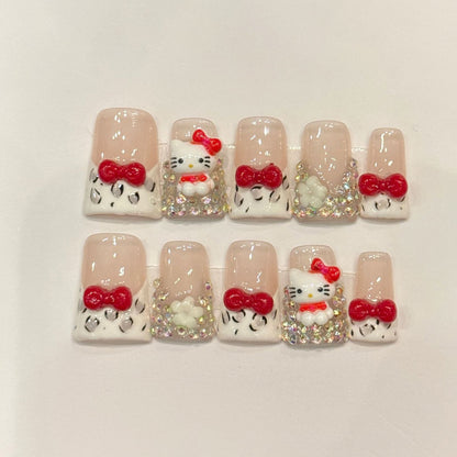 Premium duck nails for kawaii fun - 3D kitty character, glossy red bows, sparkling silver glitter, leopard spots, perfect for cute celebrations