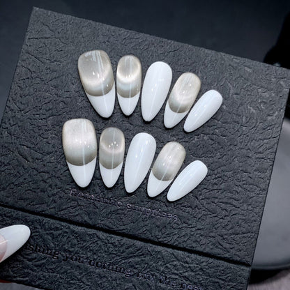 Premium handmade almond press-on nails with minimalist design in classic white & nude tones with subtle shimmer finish