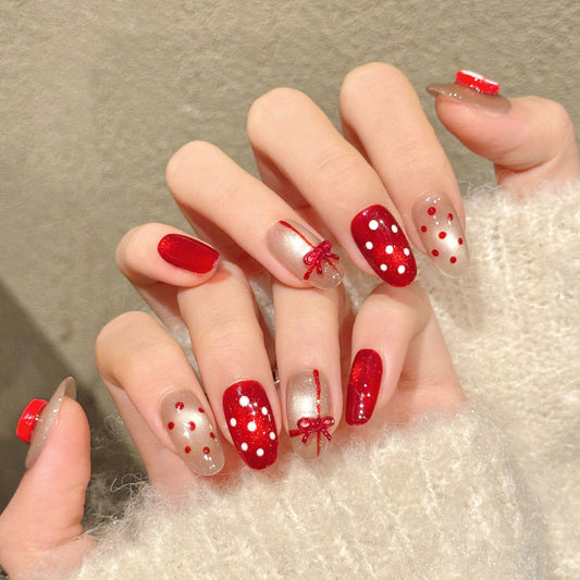 Premium oval nails for Christmas cheer - 3D red apple, glossy red bow, white polka dots, high-shine finish, perfect for festive parties & gatherings