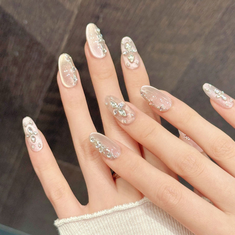 Premium oval nails for elegant luxury - crystal diamond accents, silver shimmer, delicate rhinestone borders, soft pink, perfect for sophisticated celebrations