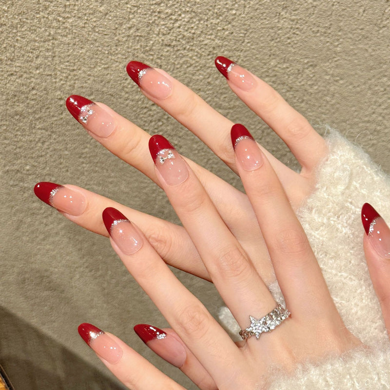 Premium oval nails for sophisticated charm - deep burgundy gloss, silver glitter scalloped border, gradient ombre, sparkling rhinestones, perfect for elegant celebrations