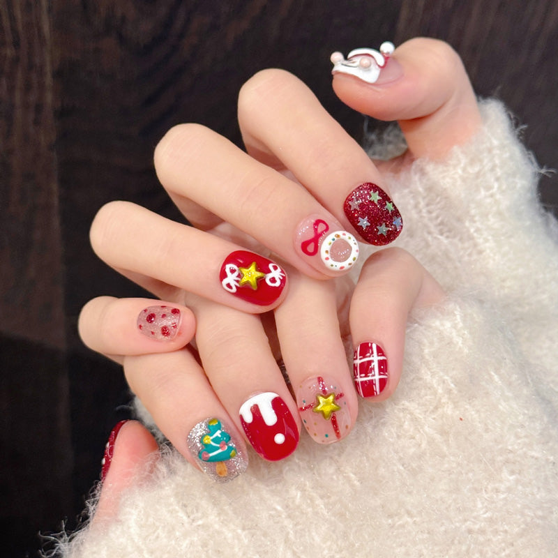Premium oval press-on nails for Christmas cheer - playful 3D snowman, Christmas tree, reindeer, snowflake glitter, perfect for holiday celebrations